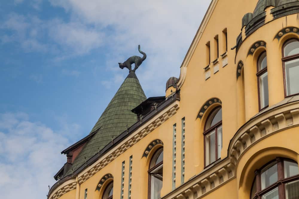 sculpture of arching cat on a rooftop in Riga