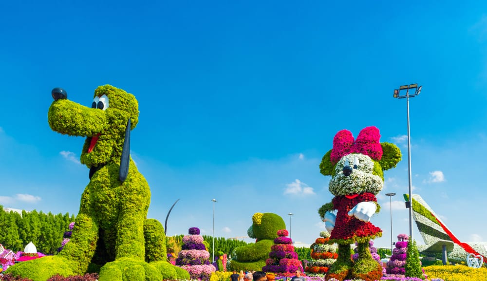 topiary art of Pluto the dog