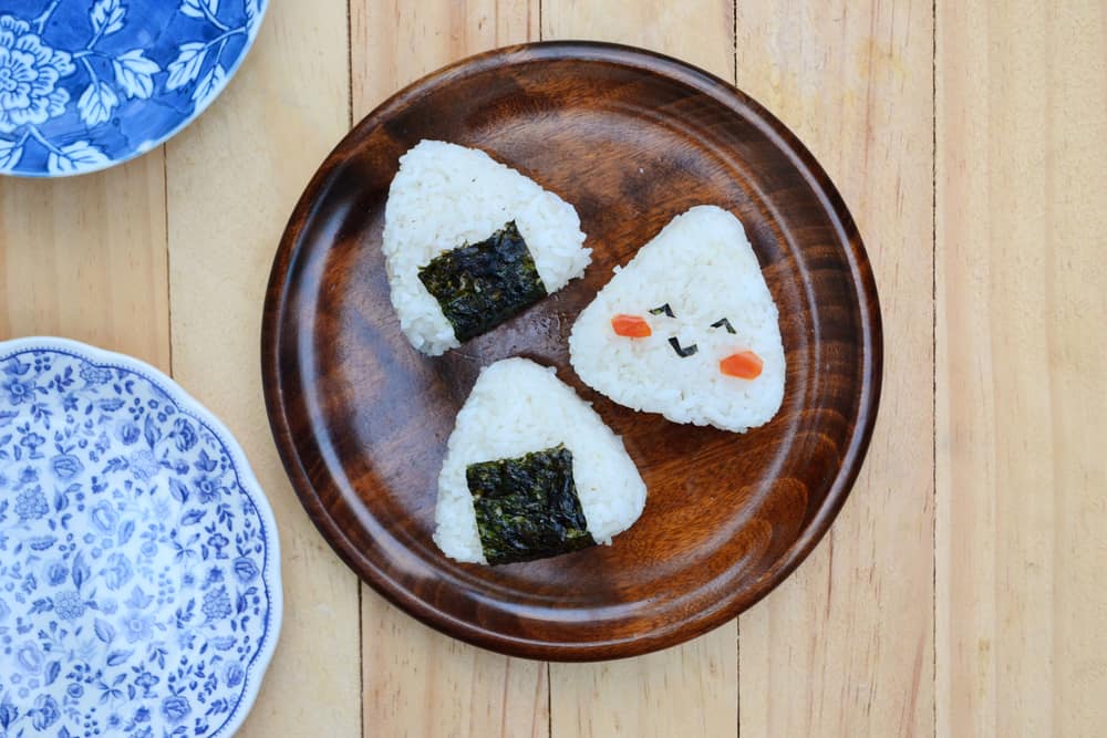 wooden plate with onigiri